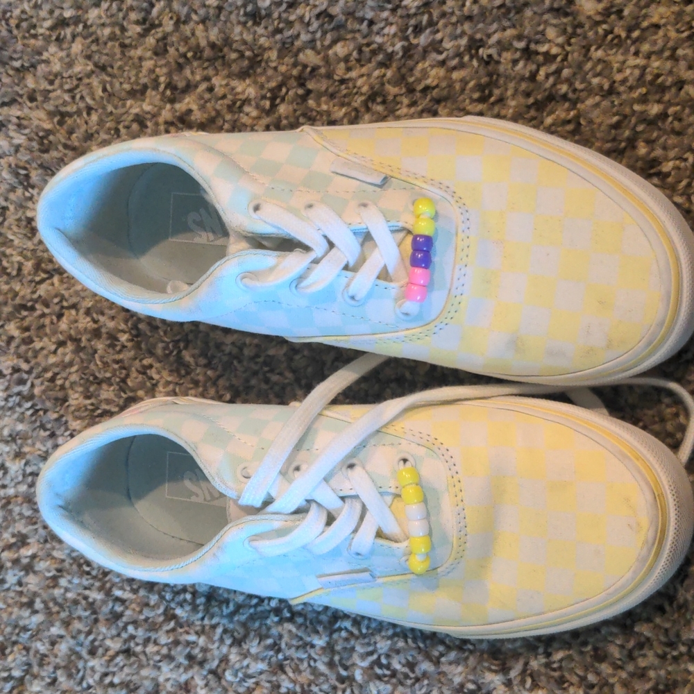 Vans size 4 they are blue yellow and pink!